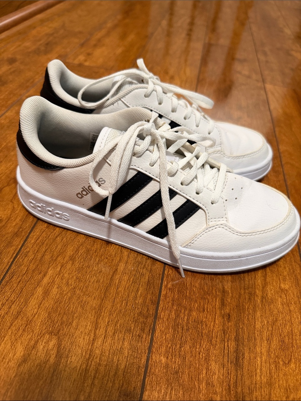 Woman’s breaknet tennis adidas White Sneakers with Black Three-Stripes